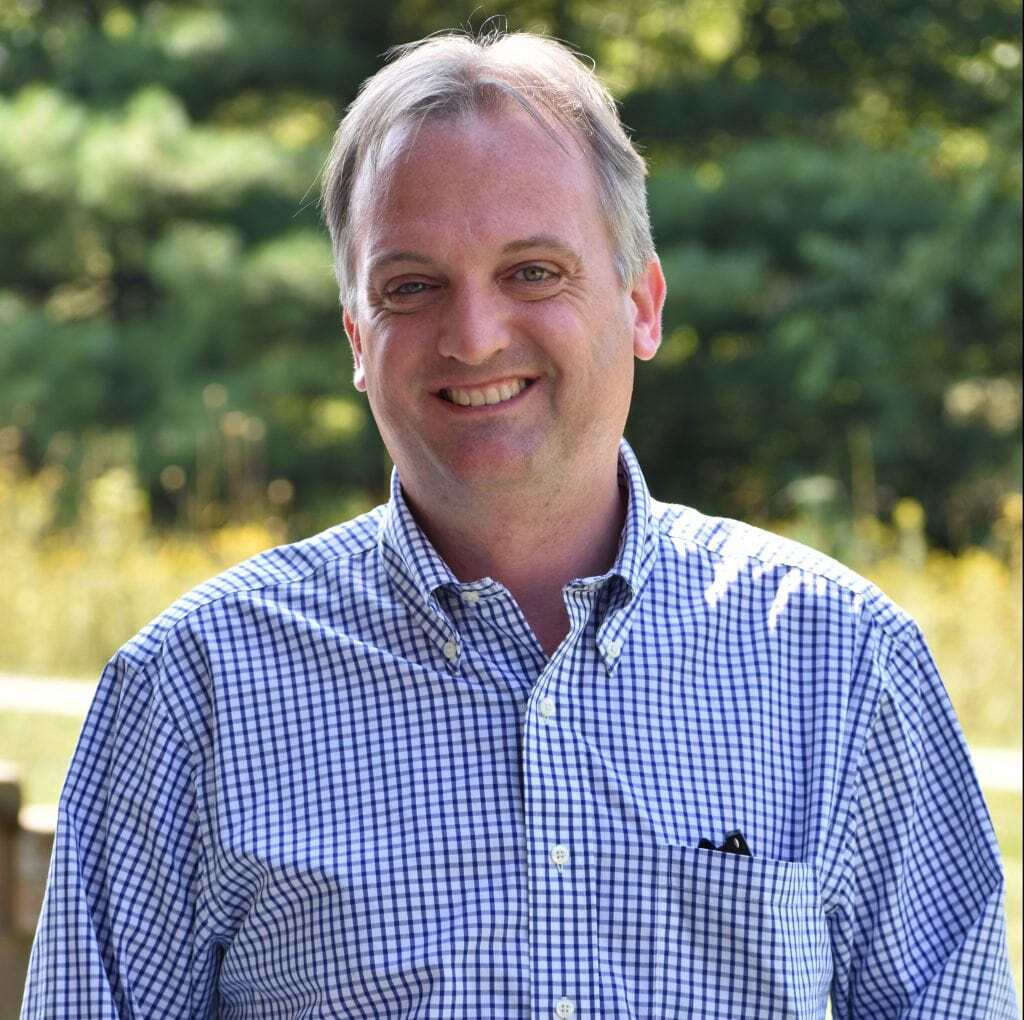 Wall Residences Admissions Director Alex Jackson standing outside