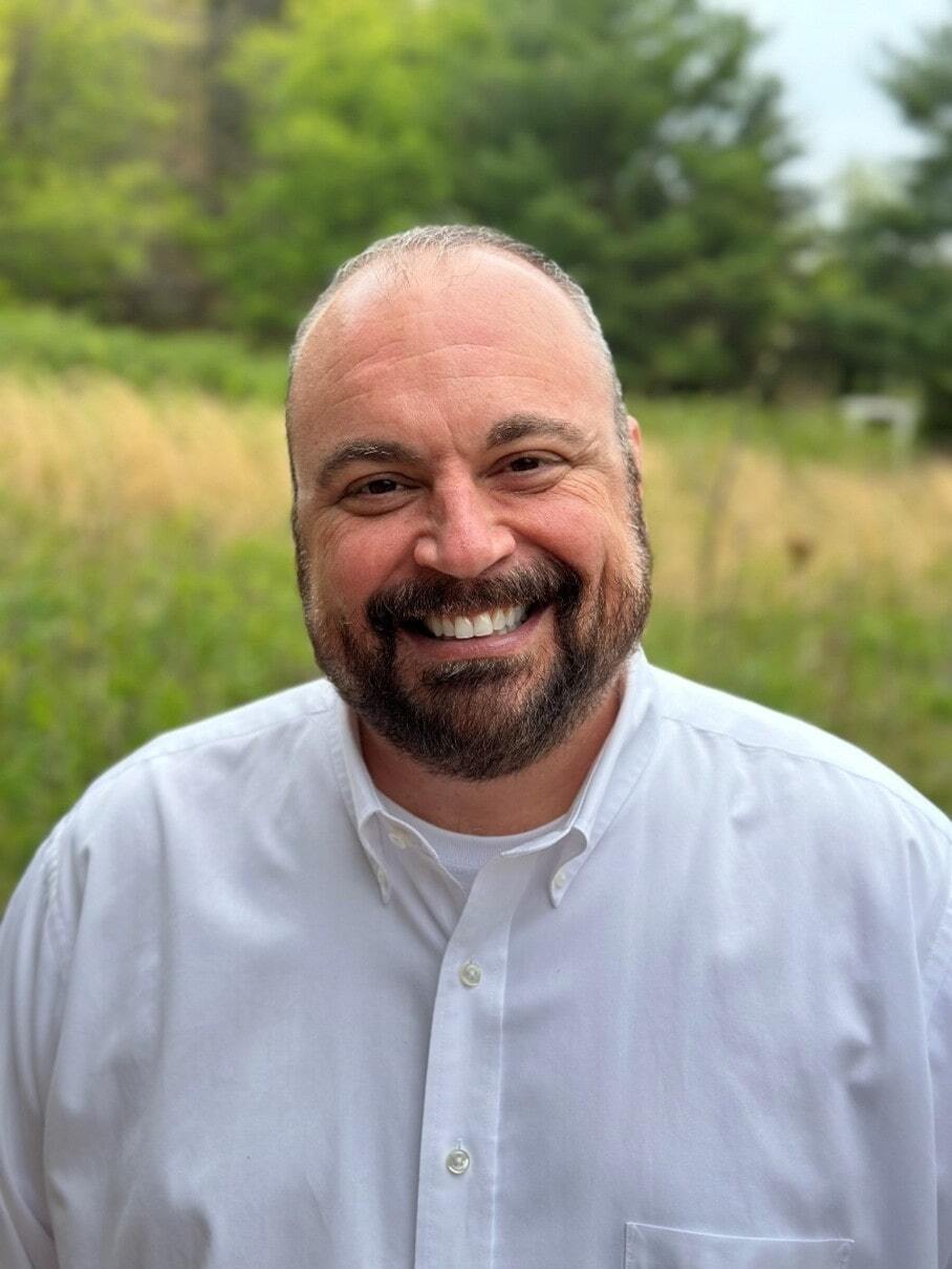 Wall Residences HR & Payroll director Clay McCoy standing outside