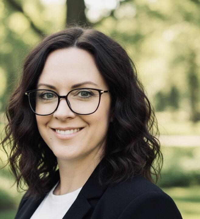 Wall Residences IT Director Connie Littles standing outside
