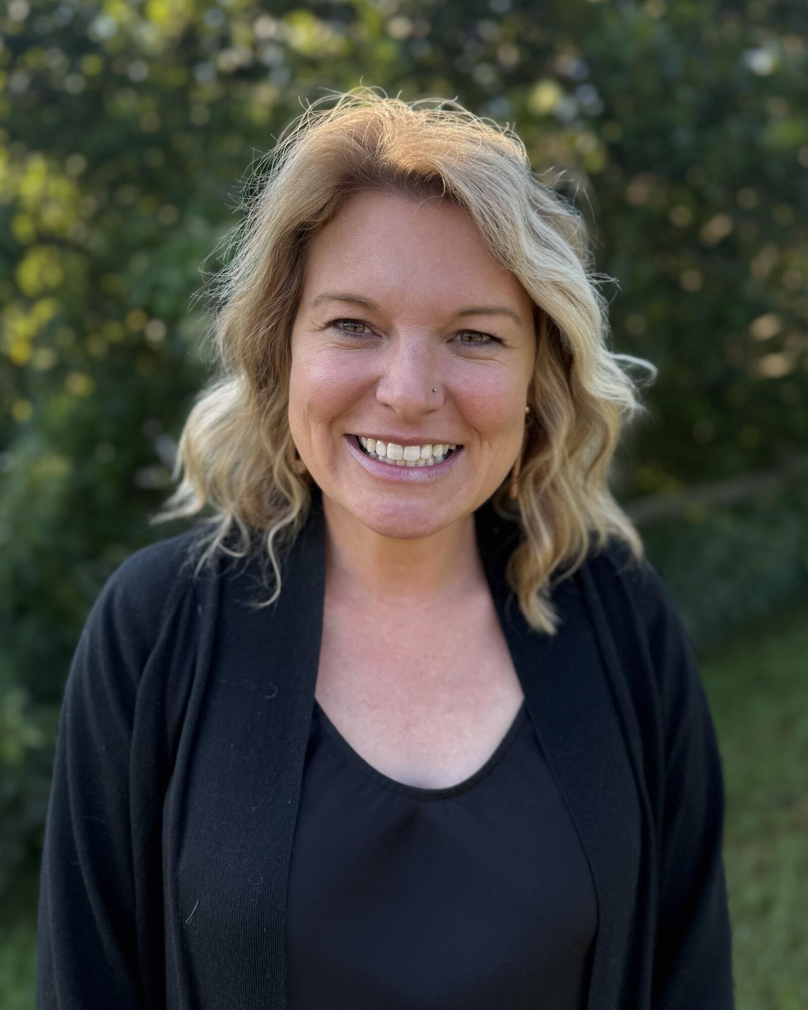 Wall VP of Therapeutic Solutions Heather Cromer standing outside