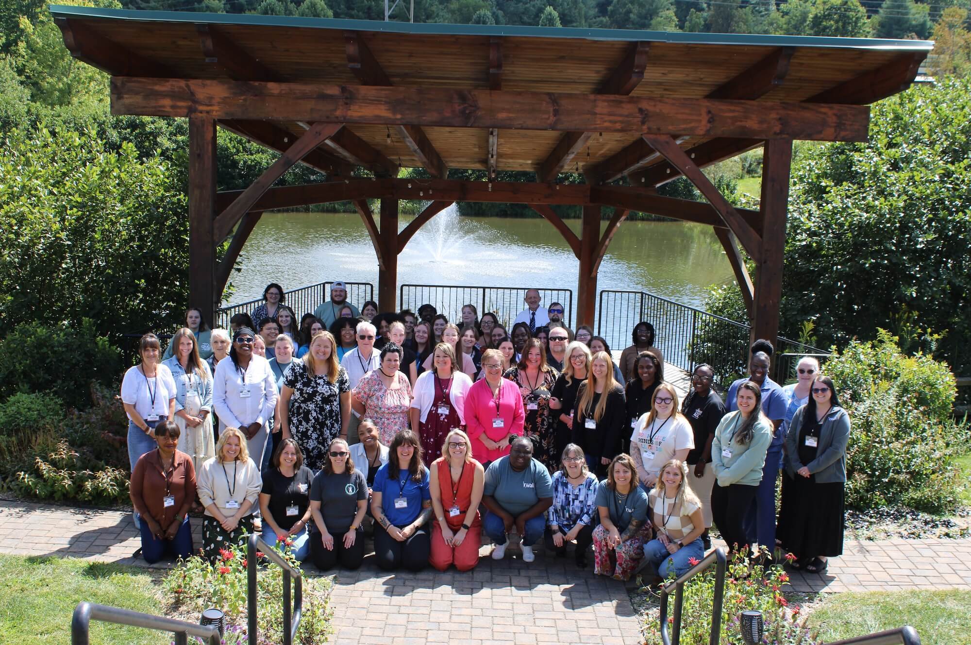 Wall Therapeutic Solutions and Residences staff standing outside for a group picture at the Floyd Office